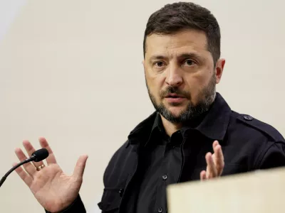 FILE PHOTO: Ukraine's President Volodymyr Zelenskiy speaks during a press conference with Denmark's Prime Minister Mette Frederiksen, on the day of the European Political Community summit in Copenhagen, Denmark, October 2, 2025. REUTERS/Leonhard Foeger/File Photo