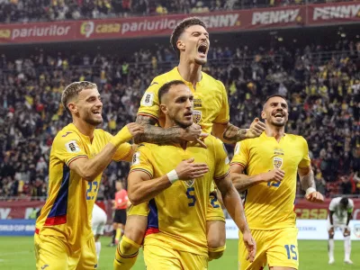 Soccer Football - FIFA World Cup - UEFA Qualifiers - Group H - Romania v Austria - Arena Nationala, Bucharest, Romania - October 12, 2025 Romania's Virgil Ghita celebrates scoring their first goal with teammates Inquam Photos via REUTERS/Bogdan Buda ROMANIA OUT. NO COMMERCIAL OR EDITORIAL SALES IN ROMANIA. THIS IMAGE HAS BEEN SUPPLIED BY A THIRD PARTY.