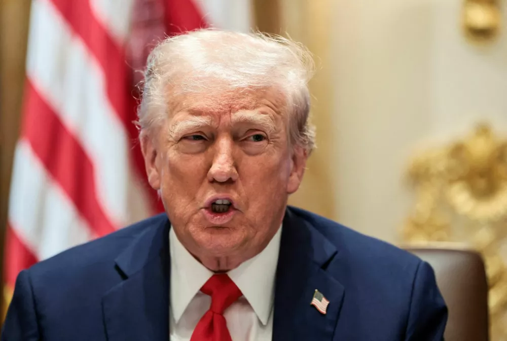 FILE PHOTO: U.S. President Donald Trump speaks during a cabinet meeting at the White House in Washington, D.C., U.S., October 9, 2025. REUTERS/Evelyn Hockstein/File Photo