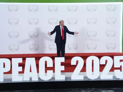 President Donald Trump waits to greet leaders during a summit to support ending the more than two-year Israel-Hamas war in Gaza after a breakthrough ceasefire deal, Monday, Oct. 13, 2025, in Sharm El Sheikh, Egypt. (AP Photo/Evan Vucci, Pool)