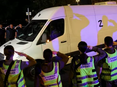 A convoy transporting the bodies of deceased hostages, kidnapped during the deadly October 7, 2023 attack by Hamas, arrives at Abu Kabir forensic centre, as part of a prisoner-hostage swap and a ceasefire deal between Israel and Hamas, in Tel Aviv, Israel October 15, 2025. REUTERS/Stoyan Nenov