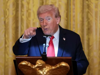 U.S. President Donald Trump speaks during a ballroom dinner in the East Room at the White House in Washington, D.C., U.S., October 15, 2025. REUTERS/Jonathan Ernst