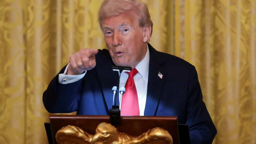 U.S. President Donald Trump speaks during a ballroom dinner in the East Room at the White House in Washington, D.C., U.S., October 15, 2025. REUTERS/Jonathan Ernst