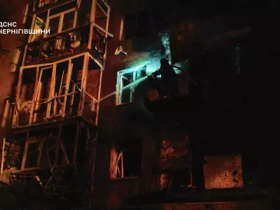 A firefighter works at the site of an apartment building hit during a Russian drone strike, amid Russia's attack on Ukraine, in the town of Nizhyn, Chernihiv region Ukraine in this handout picture released October 16, 2025. Press service of the State Emergency Service of Ukraine in Chernihiv region/Handout via REUTERS ATTENTION EDITORS - THIS IMAGE HAS BEEN SUPPLIED BY A THIRD PARTY. MUST NOT OBSCURE LOGO.