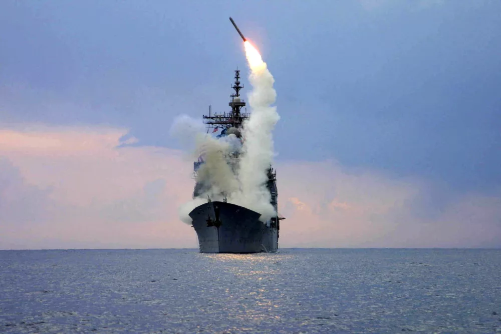 FILE PHOTO: A Tomahawk Land Attack Missile (TLAM) is launched from the guided missile cruiser USS Cape St. George, arch 23, 2003.  REUTERS/U.S. Navy/Intelligence Specialist 1st Class Kenneth Moll/File Photo/File Photo