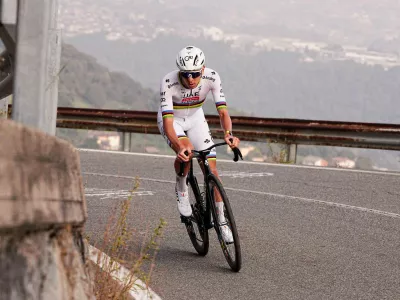 Reigning World Champion Tadej Pogacar pedals on his way to win Il Lombardia, Tour of Lombardy cycling race, in Bergamo, Italy, Saturday, Oct. 11, 2025. (Marco Alpozzi/LaPresse via AP)