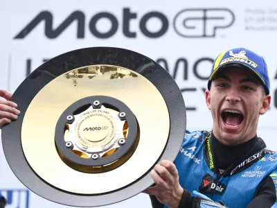 Raul Fernandez of Spain for Trackhouse Racing celebrates after winning the MotoGP at the Australian Motorcycle Grand Prix at Phillip Island, Australia, Sunday, Oct. 19, 2025. (Joel Carrett/AAPImage via AP)