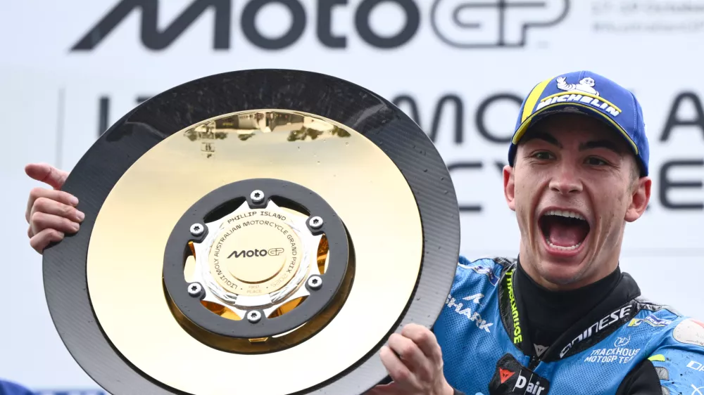 Raul Fernandez of Spain for Trackhouse Racing celebrates after winning the MotoGP at the Australian Motorcycle Grand Prix at Phillip Island, Australia, Sunday, Oct. 19, 2025. (Joel Carrett/AAPImage via AP)