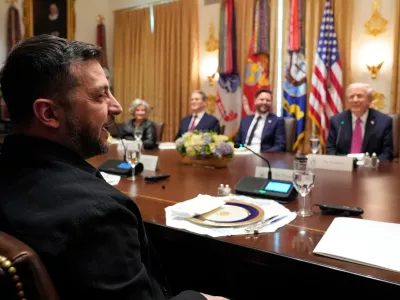 Ukraine's President Volodymyr Zelenskyy speaks as President Donald Trump, from right, Vice President JD Vance, Treasury Secretary Scott Bessent and White House Chief of Staff Susie Wiles listen before a lunch with in the Cabinet Room of the White House, Friday, Oct. 17, 2025, in Washington. (AP Photo/Alex Brandon)