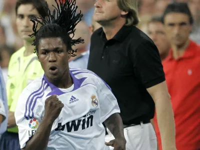 Real Madrid player Royston Drenthe, from Netherlands, celebrates his goal against Sevilla during their Spanish Supercup second leg, soccer match at the Santiago Bernabeu in Madrid, Sunday, Aug. 19, 2007. (AP Photo/Bernat Armangue)