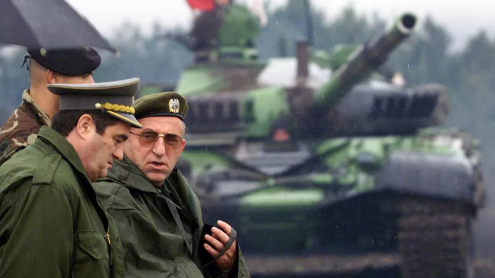 Former Yugoslav army chief of staff General Nebojsa Pavkovic, left, and General Vladimir Lazarevic, right, are seen in this Sept. 1, 2000 photo. The Yugoslav war crimes tribunal on Monday Oct. 20 2003 indicted four Serbian army and police generals for alleged atrocities against ethnic Albanians in Kosovo, including Pavkovic and Lazarevic. (AP Photo/Darko Vojinovic)
