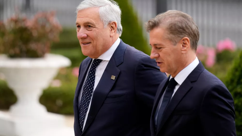 Slovenian Prime Minister Robert Golob welcomes Italy's Foreign Minister Antonio Tajani, left, as he arrives for the summit of the informal MED9 group of the nine like-minded Mediterranean EU Member States, in Portoroz, Slovenia, Monday, Oct. 20, 2025. (AP Photo/Darko Bandic)