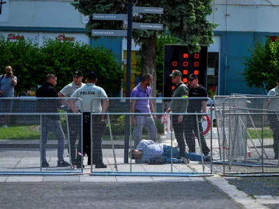A person is detained after shooting incident of Slovak PM Robert Fico, after a Slovak government meeting in Handlova, Slovakia, May 15, 2024. REUTERS/Radovan Stoklasa