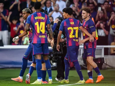 21 October 2025, Spain, BarcelonaBarcelona's Fermin Lopez celebrates his goal with teammates during the UEFA Champions League soccer match between FC Barcelona and Olympiakos FC at Estadi Olimpic Lluis Companys. PhotoMatthieu Mirville/ZUMA Press Wire/dpa