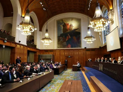 Judges, including Yuji Iwasawa, sit the International Court of Justice (ICJ) on the day of a delivery of a non-binding Advisory Opinion on Israel's obligations regarding the presence and activities of the United Nations and other international actors in the occupied Palestinian territory, in a public sitting in The Hague, Netherlands, October 22, 2025. REUTERS/Piroschka van de Wouw