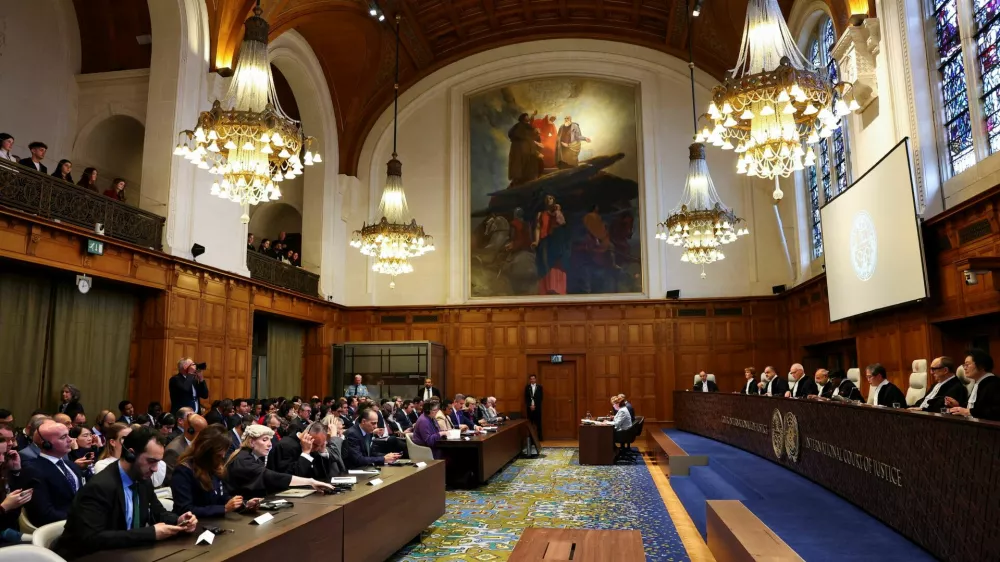 Judges, including Yuji Iwasawa, sit the International Court of Justice (ICJ) on the day of a delivery of a non-binding Advisory Opinion on Israel's obligations regarding the presence and activities of the United Nations and other international actors in the occupied Palestinian territory, in a public sitting in The Hague, Netherlands, October 22, 2025. REUTERS/Piroschka van de Wouw