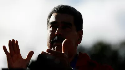 FILE PHOTO: Venezuela's President Nicolas Maduro participates in a demonstration to mark Indigenous Resistance Day, in Caracas, Venezuela, October 12, 2025. REUTERS/Leonardo Fernandez Viloria/File Photo