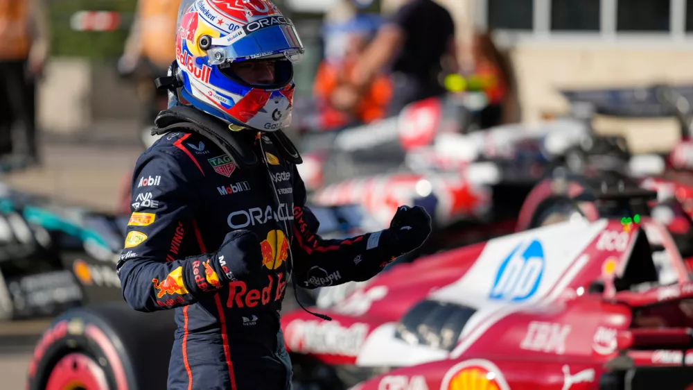Red Bull driver Max Verstappen of the Netherlands celebrates his pole position after the qualification for the Formula One U.S. Grand Prix race in Austin, Texas, Saturday, Oct. 18, 2025. (AP Photo/John Locher)