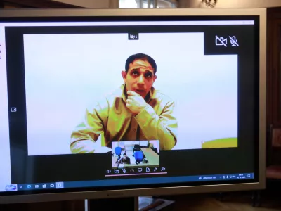 24.10.2025 - sodišče, obtoženi Blekier Ayou, Tarza Tahir (čez cel ekran)Foto: Tomaž Skale