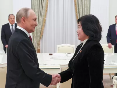 Russian President Vladimir Putin shakes hands with North Korean Foreign Minister Choe Son Hui during their meeting at the Kremlin in Moscow, Russia, Monday, Oct. 27, 2025. (Vyacheslav Prokofyev, Sputnik, Kremlin Pool Photo via AP)