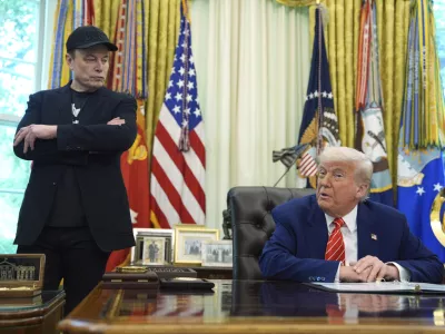 FILE - President Donald Trump, right, speaks during a news conference with Elon Musk in the Oval Office of the White House, in Washington, May 30, 2025,. (AP Photo/Evan Vucci, File)