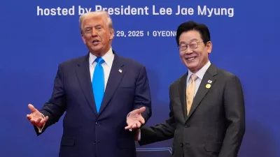 President Donald Trump poses for a photo with South Korean President Lee Jae Myung during a dinner event in Gyeongju, South Korea, Wednesday, Oct. 29, 2025. (AP Photo/Mark Schiefelbein)