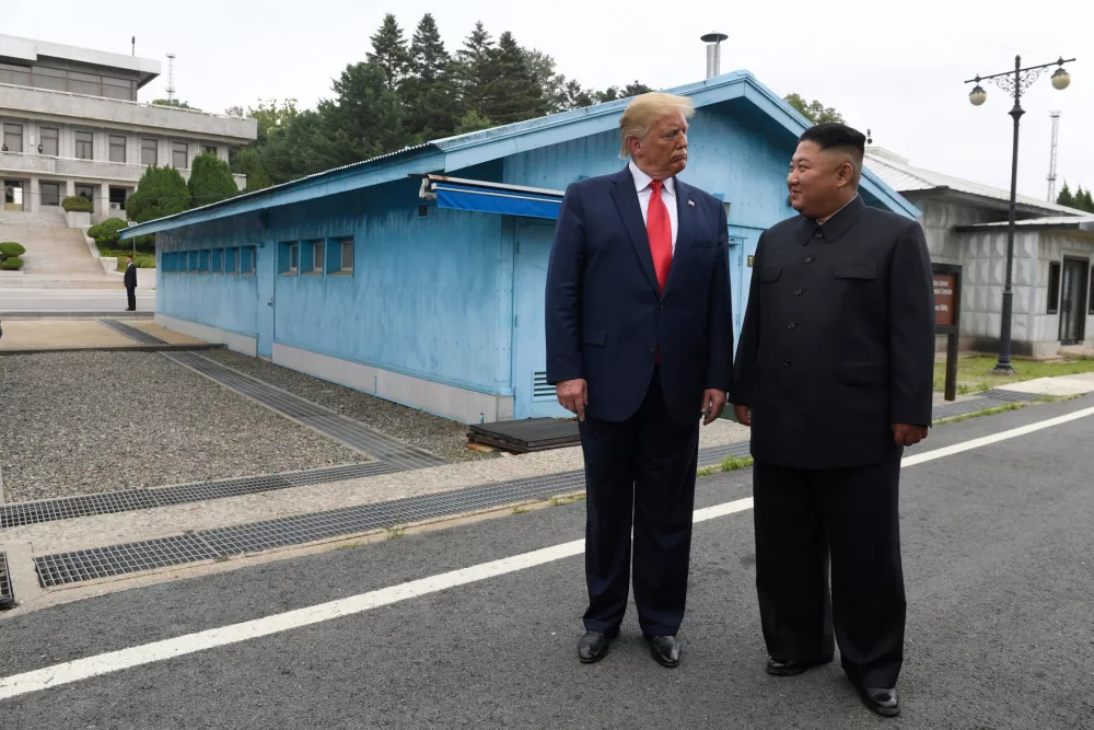 FILE - In this June 30, 2019, file photo, U.S. President Donald Trump, left, meets with North Korean leader Kim Jong Un at the border village of Panmunjom in Demilitarized Zone, South Korea. North Korea on Tuesday, Nov. 5, 2019, said the U.S. redesignation of Pyongyang as a sponsor of terrorism is dimming prospects for nuclear diplomacy between the countries. (AP Photo/Susan Walsh, File)