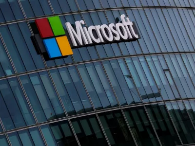 FILE PHOTO: A view shows a Microsoft logo at Microsoft offices in Issy-les-Moulineaux near Paris, France, March 21, 2025. REUTERS/Gonzalo Fuentes/File Photo