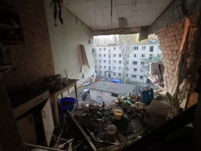 A ruined room is seen from inside the damaged hostel after Russia's missile attack in Zaporizhzhia, Ukraine, Thursday, Oct. 30, 2025. (AP Photo/Kateryna Klochko)