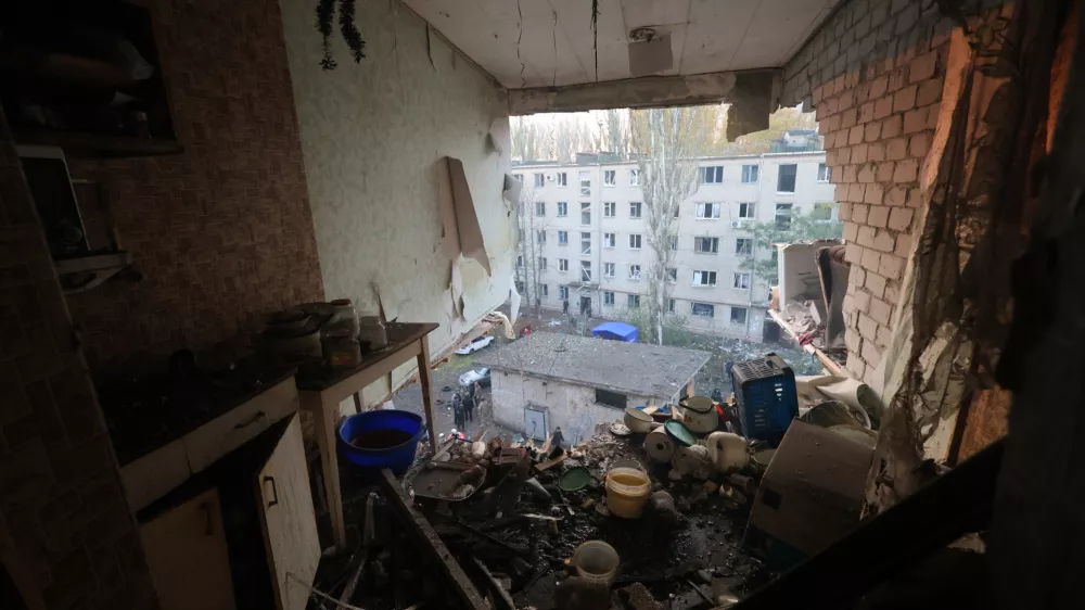 A ruined room is seen from inside the damaged hostel after Russia's missile attack in Zaporizhzhia, Ukraine, Thursday, Oct. 30, 2025. (AP Photo/Kateryna Klochko)