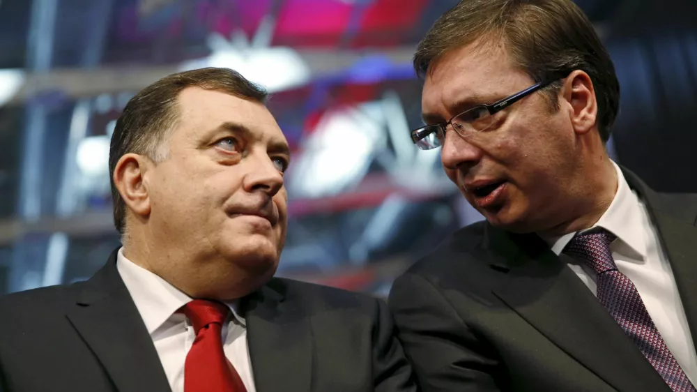 ﻿Milorad Dodik (L), president of the Republika Srpska, and Serbian Prime Minister Aleksandar Vucic attend the official celebration ceremony of Republika Srpska Statehood Day in Banja Luka, Bosnia and Herzegovina, January 9, 2015. Bosnian Serbs organised celebrations of the Statehood Day of their half of Bosnia despite the constitutional court's ruling to change the date for the holiday which was found to discriminate against other ethnic groups because it is also celebrated as an Orthodox holiday. REUTERS/Dado Ruvic - RTX21MM7