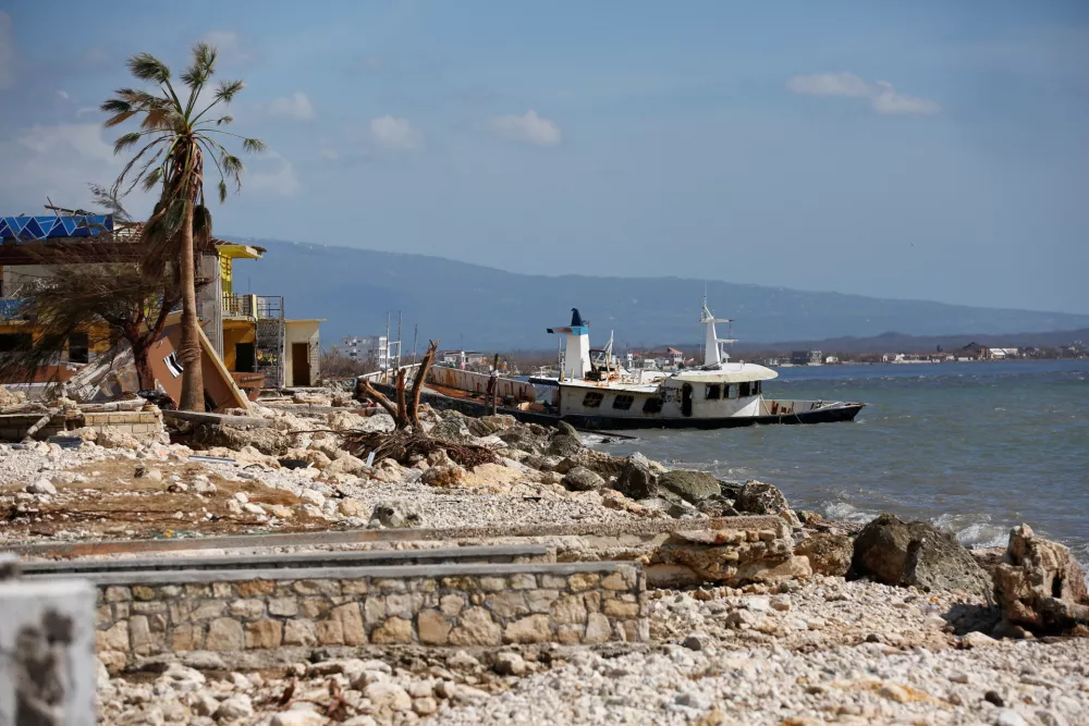 A boat rests on the shore after Hurricane Melissa made landfall in Black River, Jamaica, October 30, 2025. REUTERS/Octavio Jones