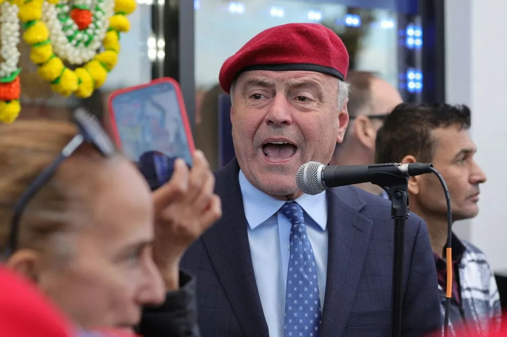 QUEENS, NEW YORK – NOVEMBER 1, 2025: Mayoral candidate and Guardian Angels founder Curtis Sliwa continued his grassroots outreach with a campaign walk along Hillside Avenue in Queens. Starting near 258th Street by the local Sliwa campaign office, he greeted residents, visited small businesses, and discussed neighborhood safety, transit, and community concerns with voters ahead of Election Day. (Photo: Luiz Rampelotto/EuropaNewswire/Sipa USA),Image: 1049779722, License: Rights-managed, Restrictions: *** World Rights *** Editorial Use Only ***, Model Release: no