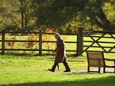 Britain's King Charles leaves following a church service at St. Mary Magdalene Church, on the Sandringham Estate, where Andrew Mountbatten Windsor, younger brother of Britain's King Charles, will move, following the king's decision to strip him of his title of prince and evict him from his Windsor residence, in Norfolk, Britain, November 2, 2025. REUTERS/Chris Radburn