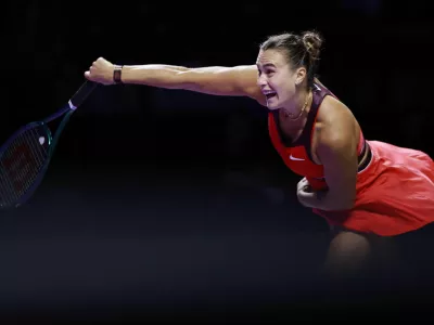 Tennis - WTA Finals - Riyadh - King Saud University Indoor Arena, Riyadh, Saudi Arabia - November 2, 2025 Belarus' Aryna Sabalenka in action during her round of 16 match against Italy's Jasmine Paolini REUTERS/Stephanie Lecocq