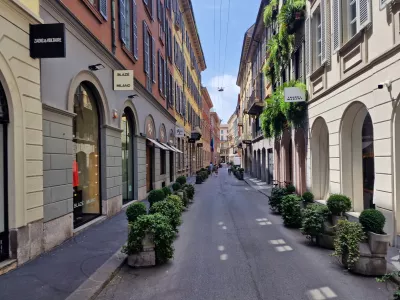 Milan, Italy - June 15, 2025: Via Santo Spirito, a high-end shopping street among historic palaces and neo-Renaissance courtyards in the Montenapoleone fashion district, Quadrilatero della Moda.