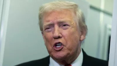 President Donald Trump speaks to reporters on board Air Force One on his way back to the White House from a weekend trip at his Mar-a-Lago estate in Palm Beach, Fla., Sunday, Nov. 2, 2025. (AP Photo/Manuel Balce Ceneta)