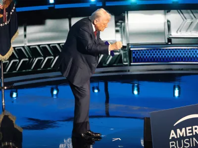 05 November 2025, US, Miami: US President Donald Trump reacts before delivering a speech at the America Business Forum at the Kaseya Center Arena in Miami. Photo: Marcin Cholewinski/ZUMA Press Wire/dpa