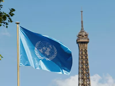 FILE PHOTO: The flag of UNESCO flies at the UNESCO headquarters, with the Eiffel Tower in the background, in Paris, France, April 17, 2025. REUTERS/Abdul Saboor/File Photo