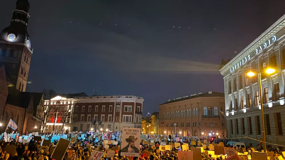 06 November 2025, Lithuania, Riga: People hold placards during a protest on Cathedral Square in the Latvian capital against a possible withdrawal of the Baltic EU country from the so-called Istanbul Convention. Photo: Alexander Welscher/dpa
