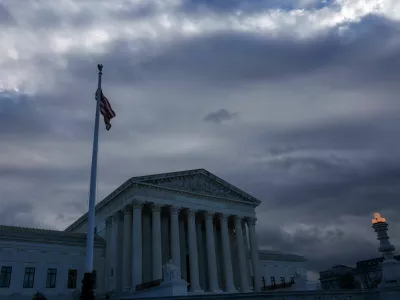 FILE PHOTO: A U.S. Flag flutters outside of the United States Supreme Court Building, in Washington, U.S., December 5, 2024. REUTERS/Evelyn Hockstein/File Photo