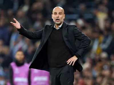 05 November 2025, United Kingdom, Manchester: Manchester City manager Pep Guardiola gestures on the touchline during the UEFA Champions League soccer match between Manchester City and Borussia Dortmund at the Etihad Stadium. Photo: Martin Rickett/PA Wire/dpa