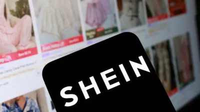 FILE PHOTO: Shein logo and their web page on smartphone in this illustration taken November 5, 2025. REUTERS/Dado Ruvic/Illustration/File Photo
