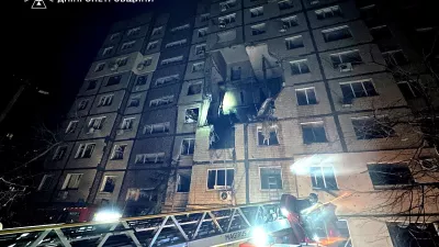 A firefighter works at the site of the apartment building hit by a Russian drone strike, amid Russia's attack on Ukraine, in Dnipropetrovsk region, Ukraine in this handout picture released November 8, 2025. Press service of the State Emergency Service of Ukraine in Dnipropetrovsk region/Handout via REUTERS ATTENTION EDITORS - THIS IMAGE HAS BEEN SUPPLIED BY A THIRD PARTY. MUST NOT OBSCURE LOGO.