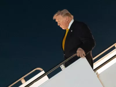 President Donald Trump arrives Palm Beach International Airport in West Palm Beach, Fla., on Air Force One, for a weekend trip at his Mar-a-Lago estate in Palm Beach, Fla., Friday, Nov. 7, 2025. (AP Photo/Manuel Balce Ceneta)