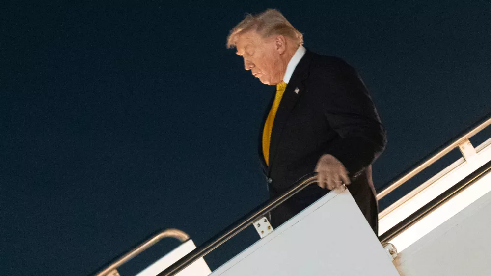 President Donald Trump arrives Palm Beach International Airport in West Palm Beach, Fla., on Air Force One, for a weekend trip at his Mar-a-Lago estate in Palm Beach, Fla., Friday, Nov. 7, 2025. (AP Photo/Manuel Balce Ceneta)