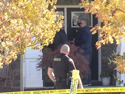 CORRECTS LAST NAME - In this image from video provided by WRTV, investigators work at the site of the fatal shooting of house cleaner Maria Florinda Rios Perez who went to the wrong address in Whitestown, Ind., on Wednesday, Nov. 5, 2025. (WRTV via AP)