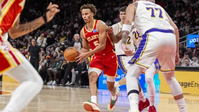 Nov 8, 2025; Atlanta, Georgia, USA; Atlanta Hawks guard Dyson Daniels (5) looks to pass against the Los Angeles Lakers during the second half at State Farm Arena. Mandatory Credit: Dale Zanine-Imagn Images