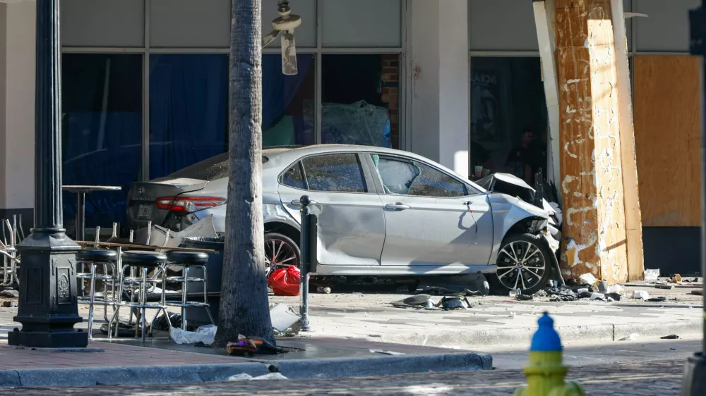 A car that crashed into a local business is shown on Saturday, Nov. 8, 2025, in Tampa, Fla. (Jefferee Woo/Tampa Bay Times via AP)