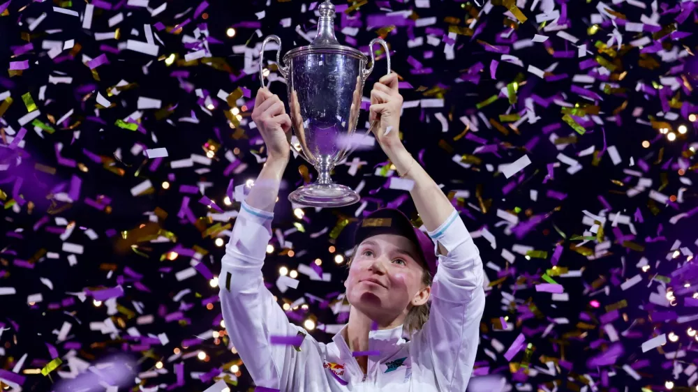 Tennis - WTA Finals - Riyadh - King Saud University Indoor Arena, Riyadh, Saudi Arabia - November 8, 2025 Kazakhstan's Elena Rybakina celebrates with the trophy after winning the final match against Belarus' Aryna Sabalenka REUTERS/Stephanie Lecocq   TPX IMAGES OF THE DAY